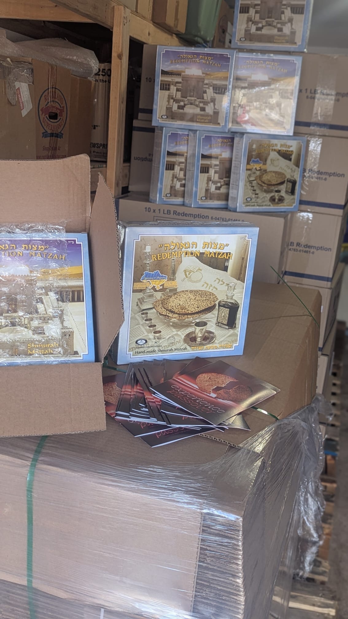 Matzah boxes and Experience Passover pamphlets in storage