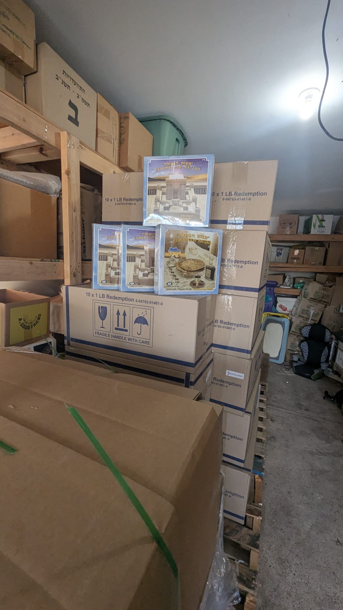 Boxes of Redemption Matzah stacked in the warehouse