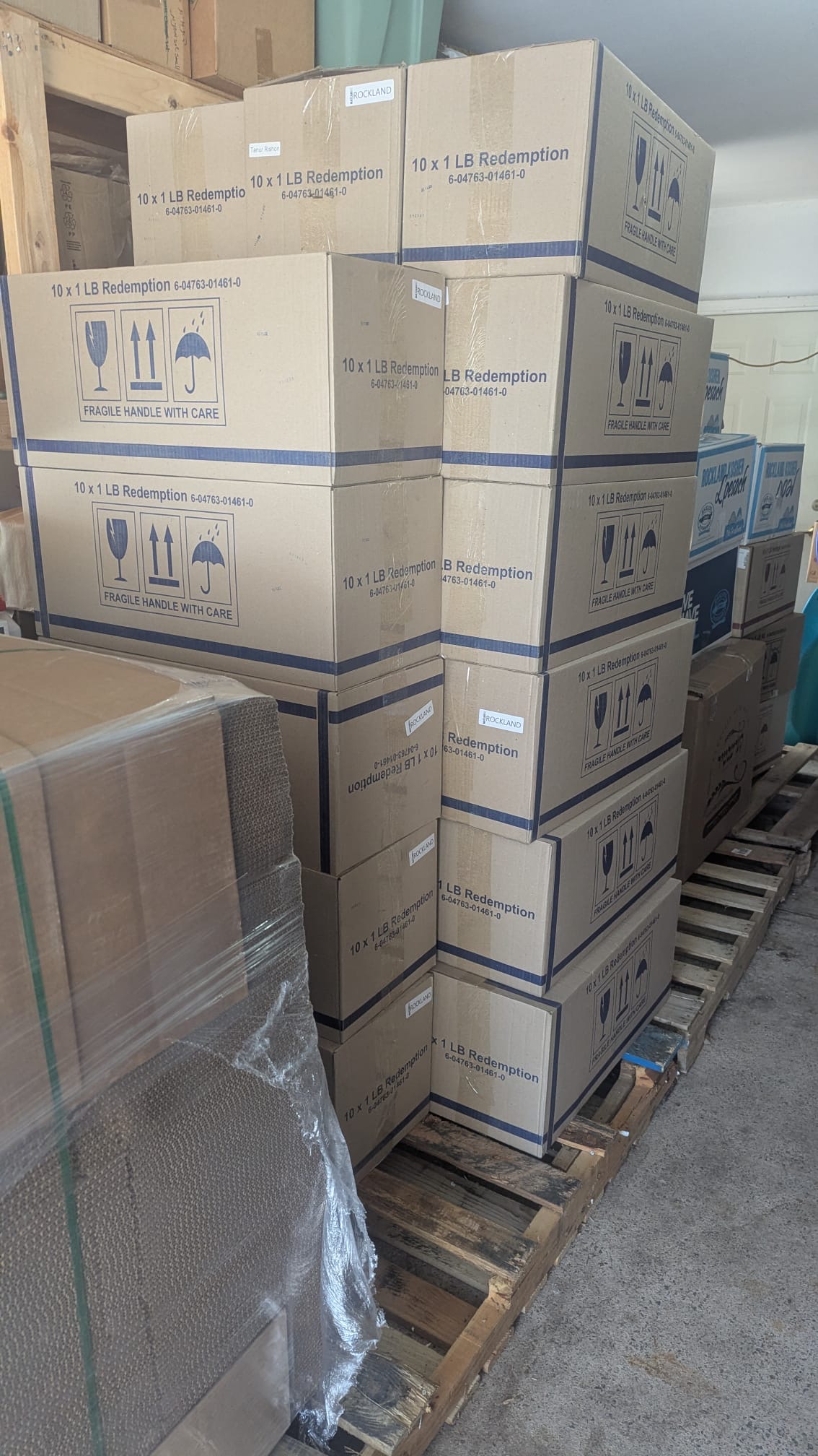 Volunteers preparing matzah boxes for shipping outdoors